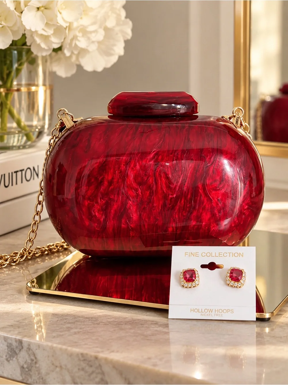 Red Marble Effect Hard Shell Crossbody Clutch with Gold Chain with earrings